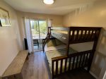 Bunk beds in main floor bedroom with full size on bottom and twin on top. Sliding door to front lanai.